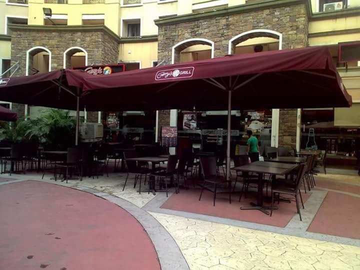 Restaurant, Palm Tree - Genlex Condominium in Manila