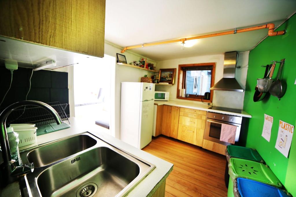 Kitchen, Tromso Activities Hostel in Tromsø