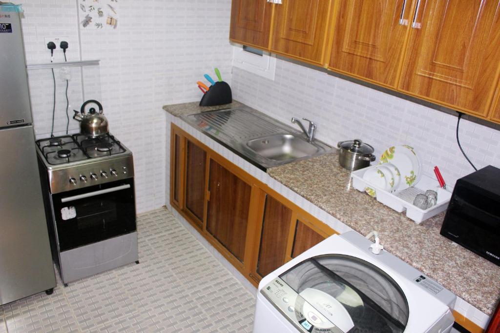 Kitchen, Al Noor Furnished Flats Apartments in Salalah