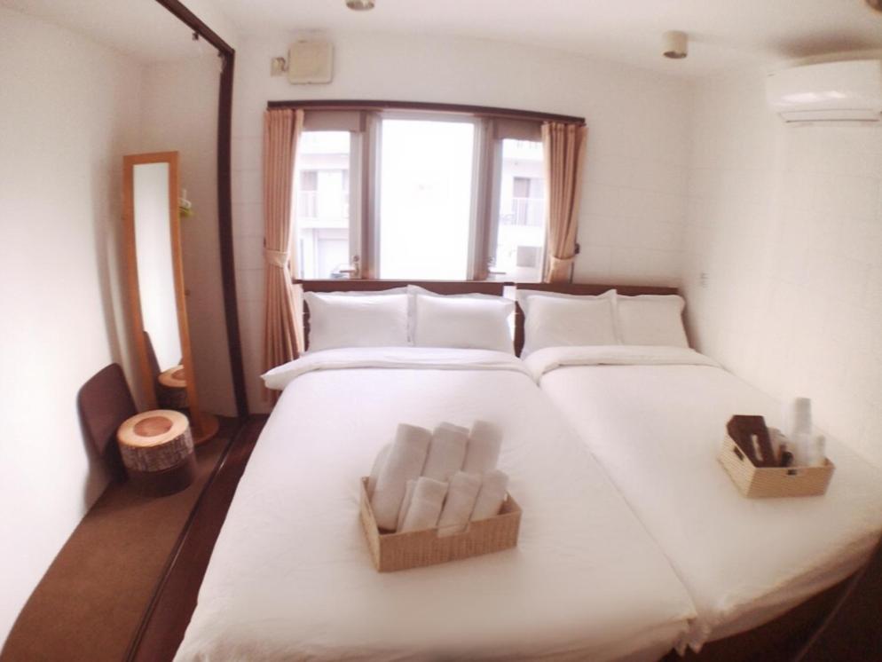 Osaka Sinsei Guest House photo