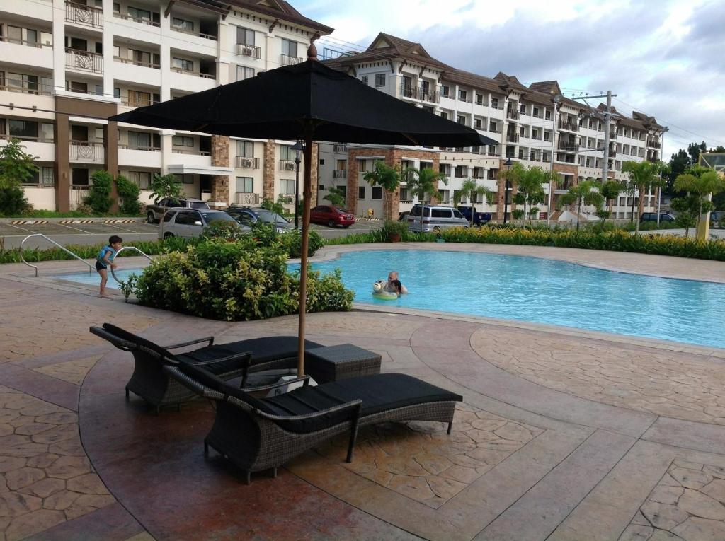 Alles Oasis Condo Near SM Mall 2BR-WIFI- photo
