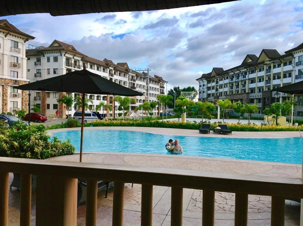 Alles Oasis Condo Near SM Mall 2BR-WIFI- photo
