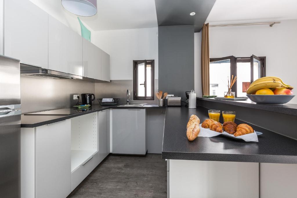 Kitchen, Sweet Home Paris Apartment in Paris