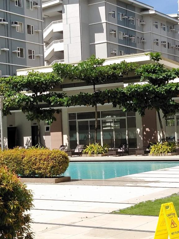 Trees Residences by Jhoms 1BR with Balcony WiFi Netflix photo