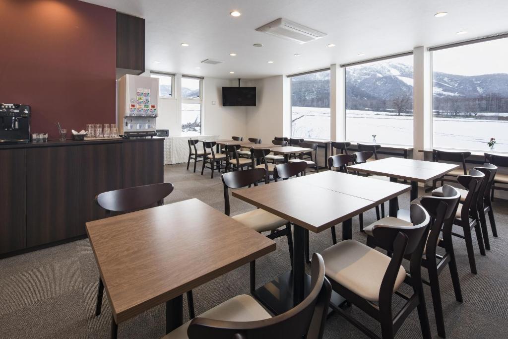 Shared lounge/TV area, Pensione UNO in Niseko