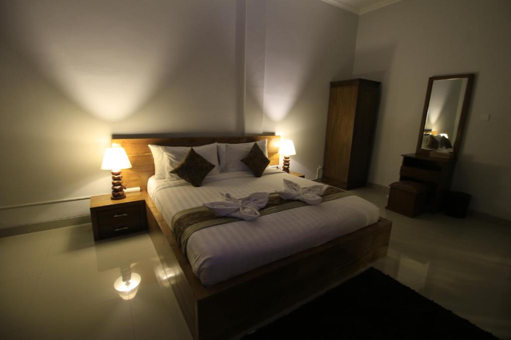 Kamar penginapan di Green Beach Inn.