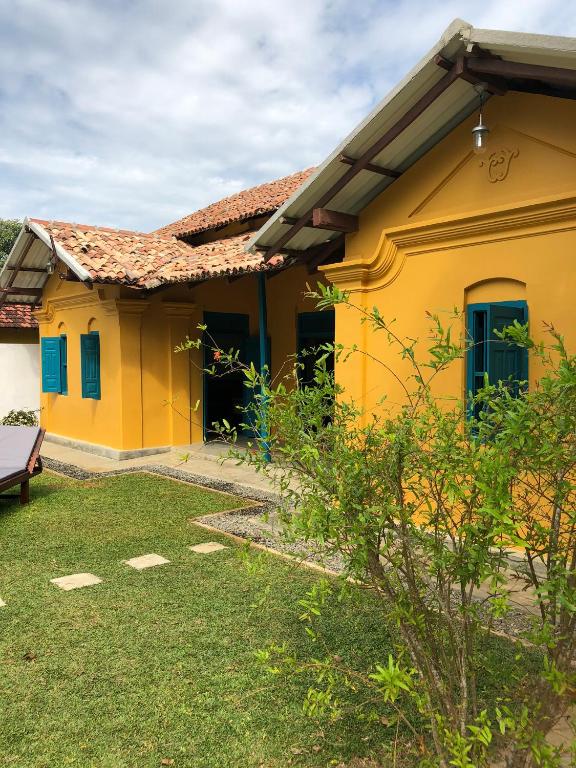yellow house mawella photo