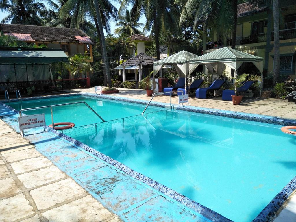 CALANGUTE BEACH VILLA # 3BHk # POOL # KITCHEN # 300MTS TO BEACH by GR Stays photo