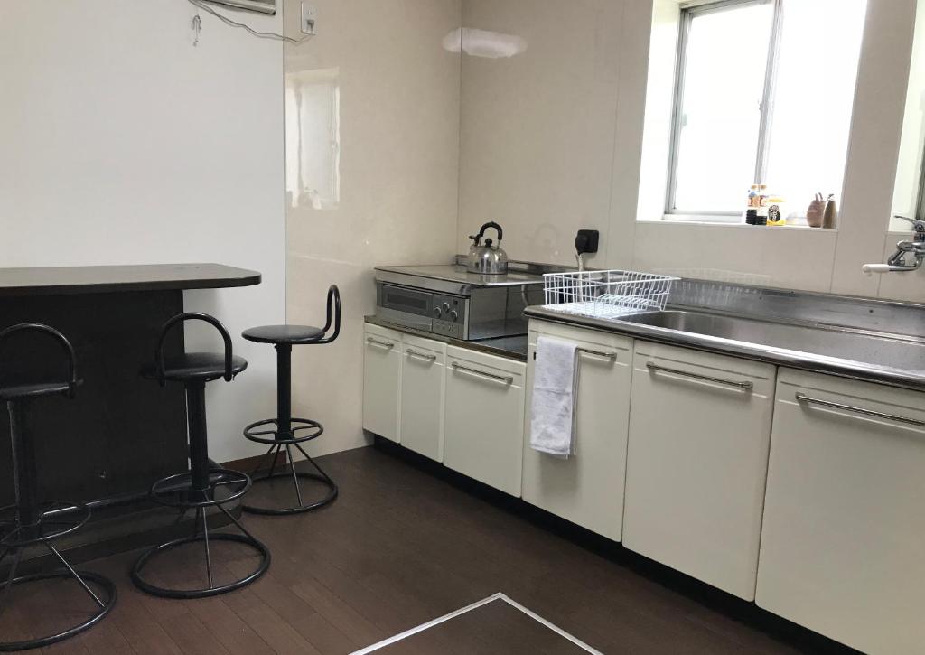 Kitchen, Guesthouse En in Omihachiman