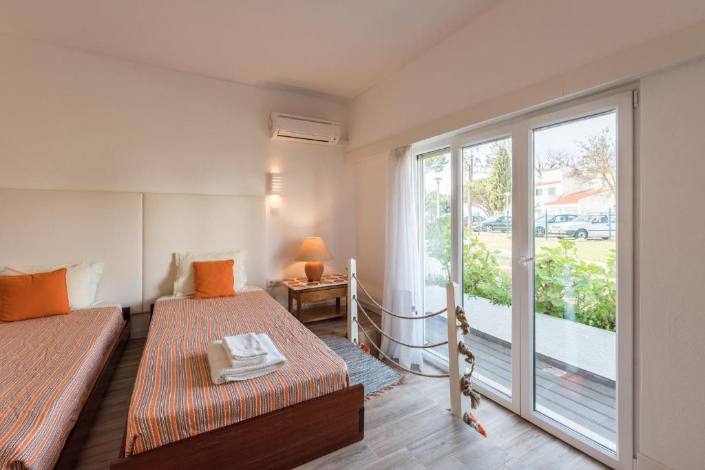 Green Oasis Villa w/Parking by beach by LovelyStay