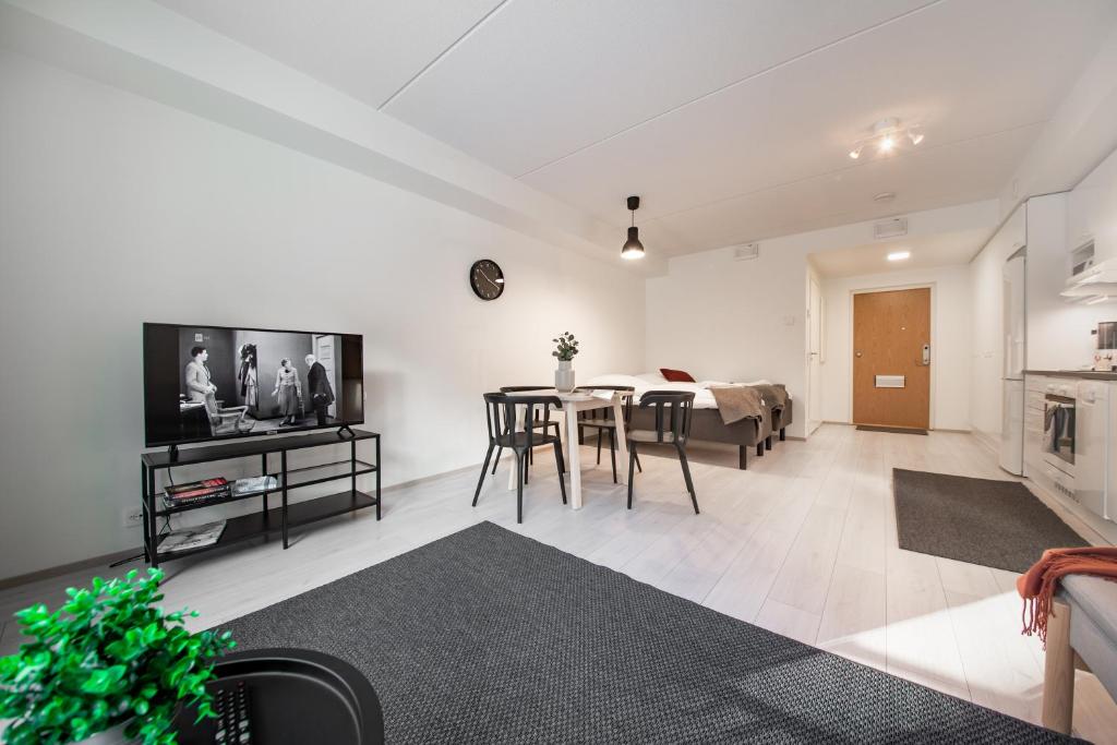 Shared lounge/TV area, Spot Apartments Espoo Center in Espoo