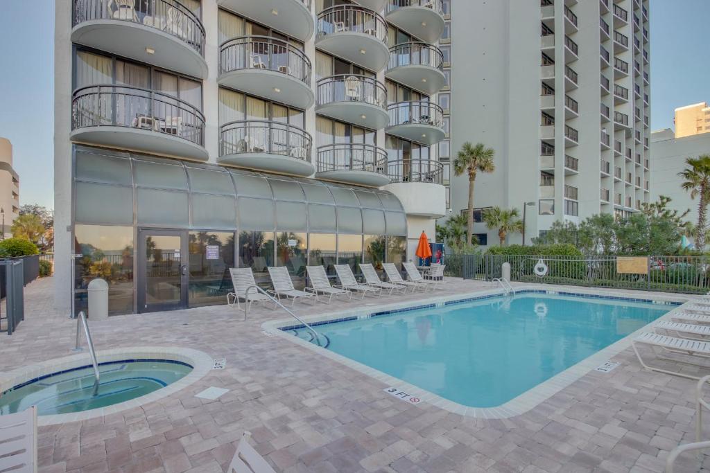 Oceanfront condo Steps to the beach w No Resort Fees photo