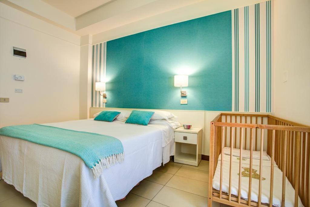 Hotel Konrad — Pokoje in Rimini, Emilia-Romania