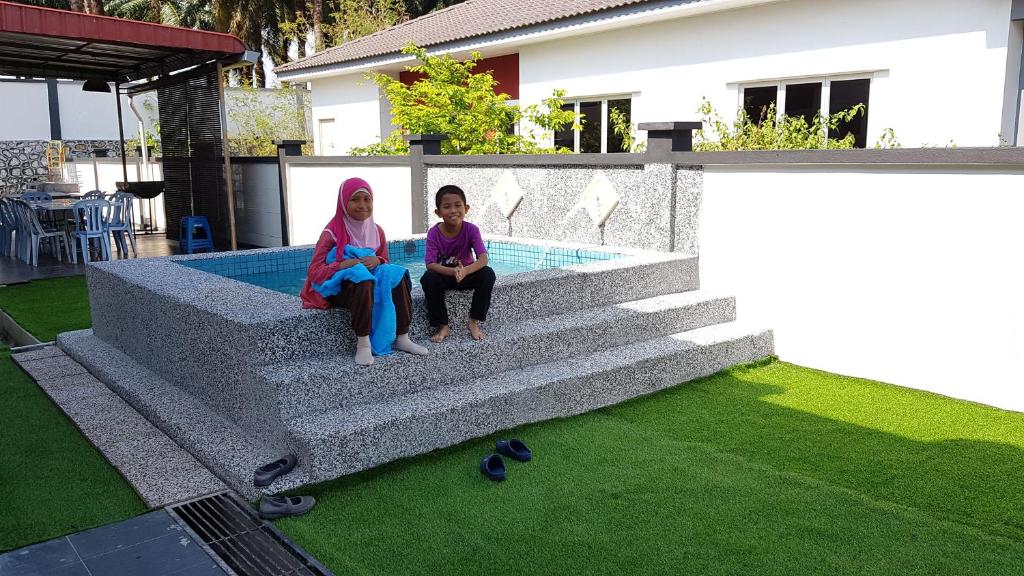 Jauzara Homestay Berkolam Renang photo