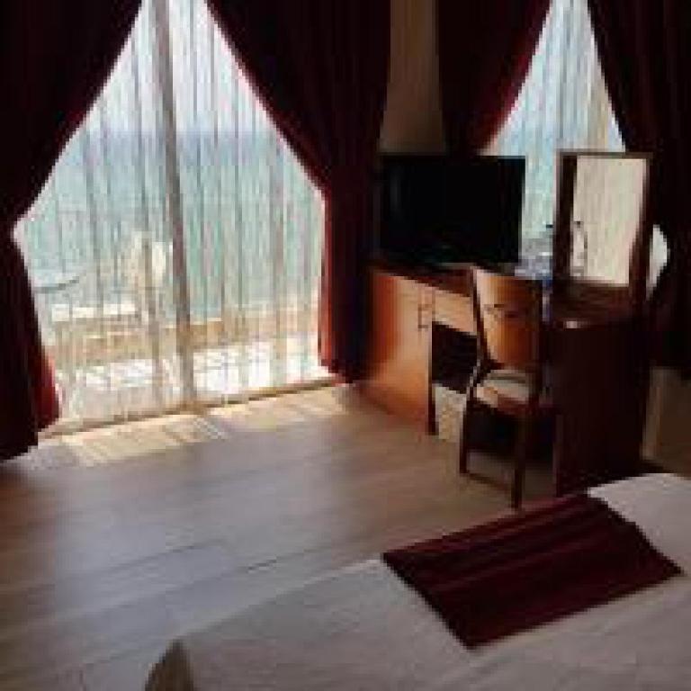 Quarto Individual com Varanda