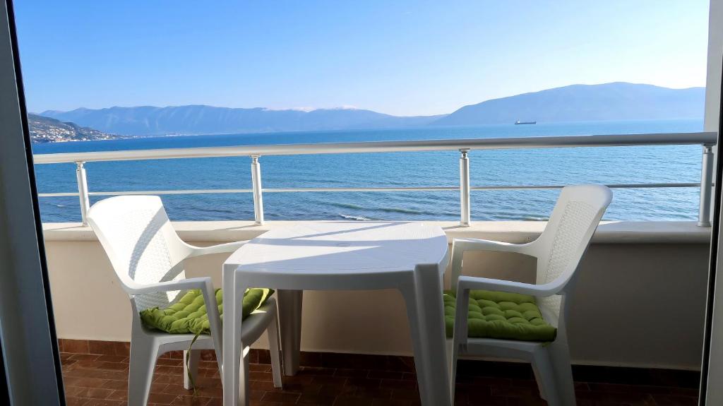 On the Beach (literally) stylish apartment with free P photo