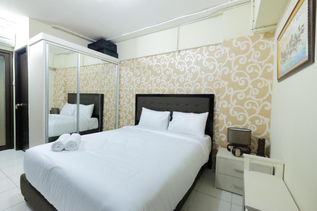 Minimalist Studio at Kebagusan City Apartment By Travelio, Jakarta