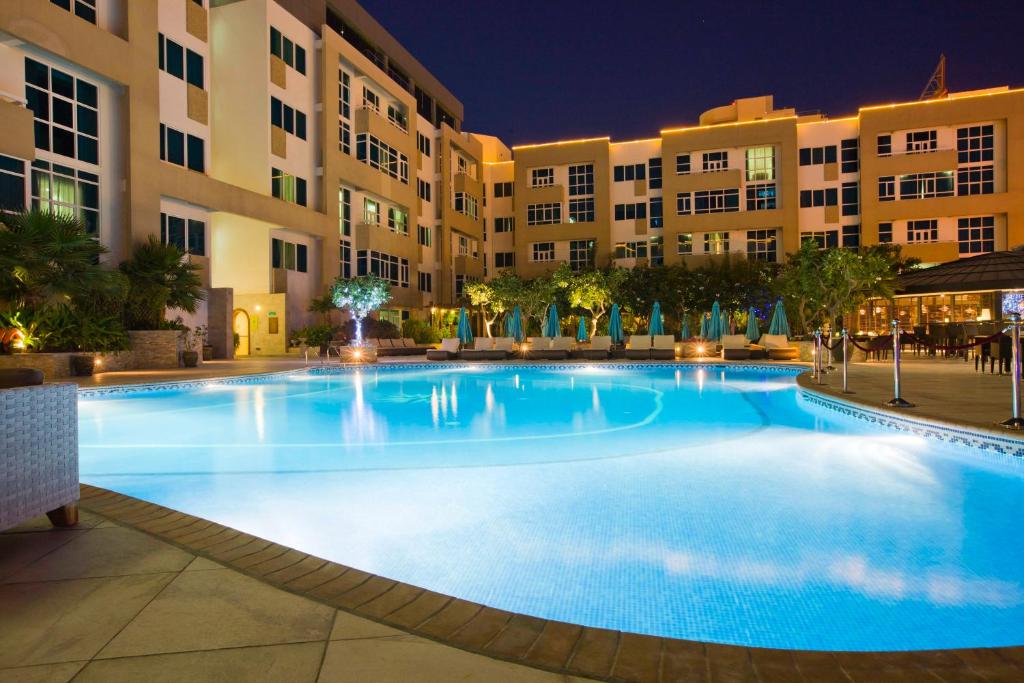 Swimming pool, Elite Seef Residence Hotel in Manama