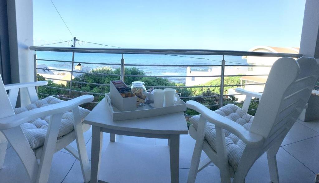 Vermont Hermanus - views, sunny, right on the sea photo
