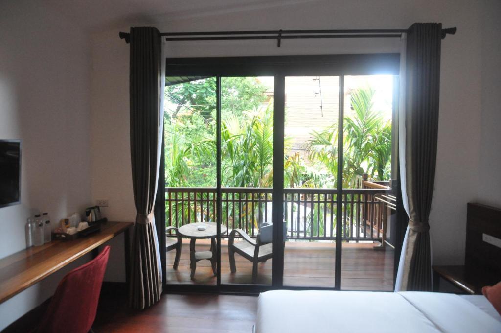 The Eight Ratvithi House - SHA Certified photo