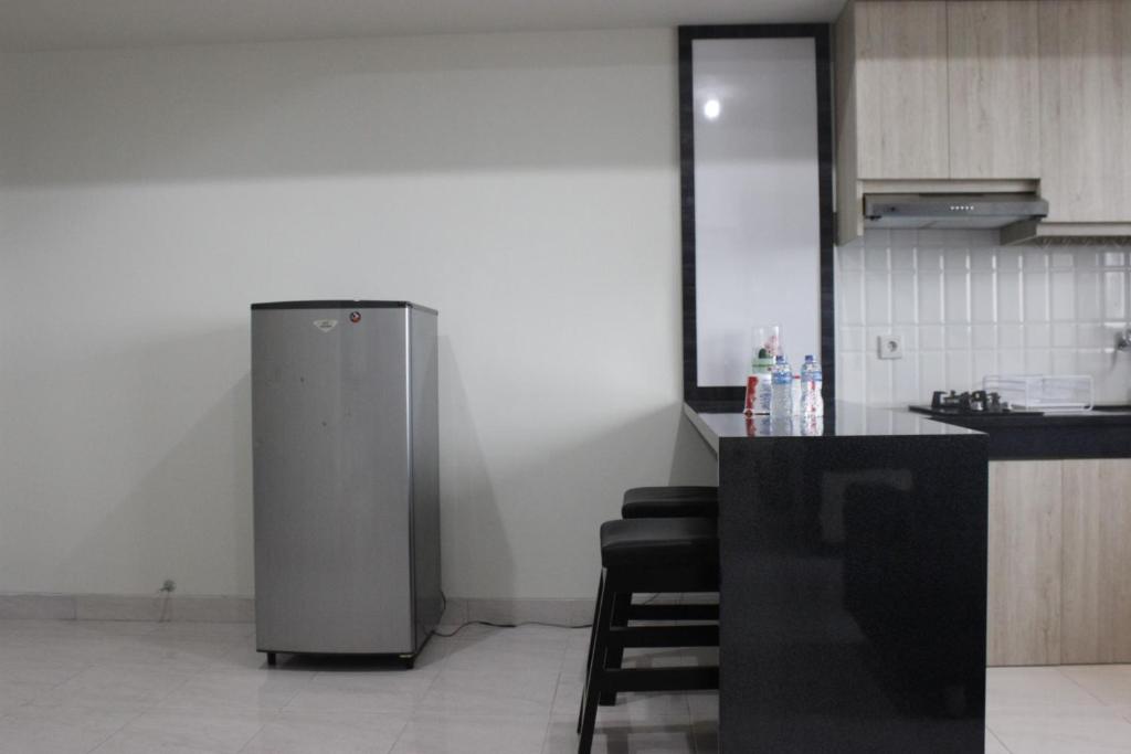 Cozy 2BR Apartment @ Newton Residence By Travelio