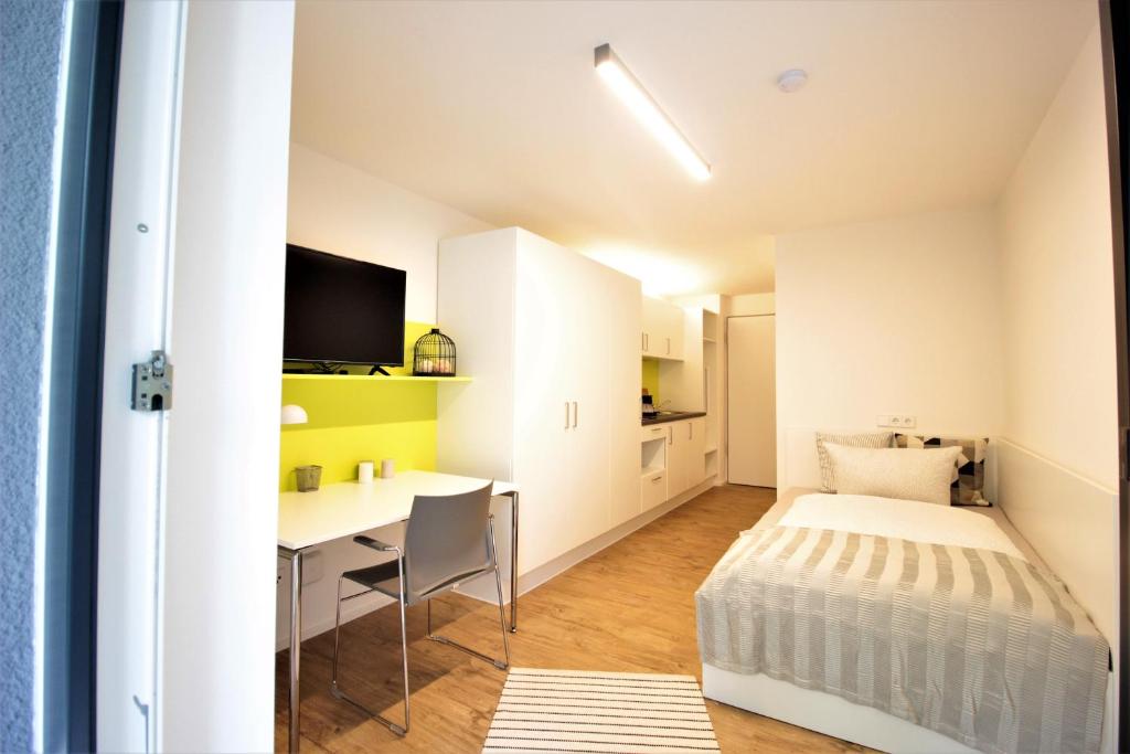Studio apartment - balcony, Netflix, university hospital proximity — Hotel in Wurzburg