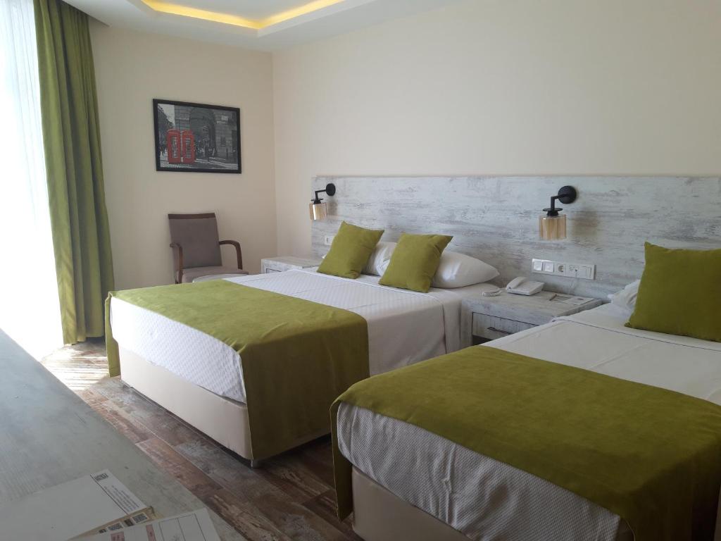 Club Turtas Beach - All Inclusive — Hotel rooms in Alanya