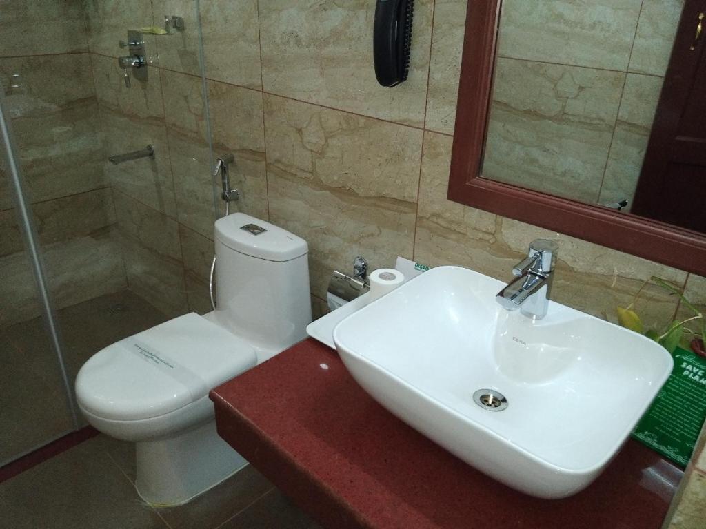Bathroom, Yuvarani Residency Hotel in Kochi