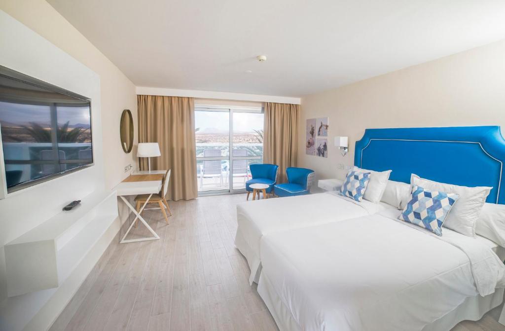 Hotel Boutique TAO Caleta Mar — Hotel rooms in Corralejo, Canary Islands
