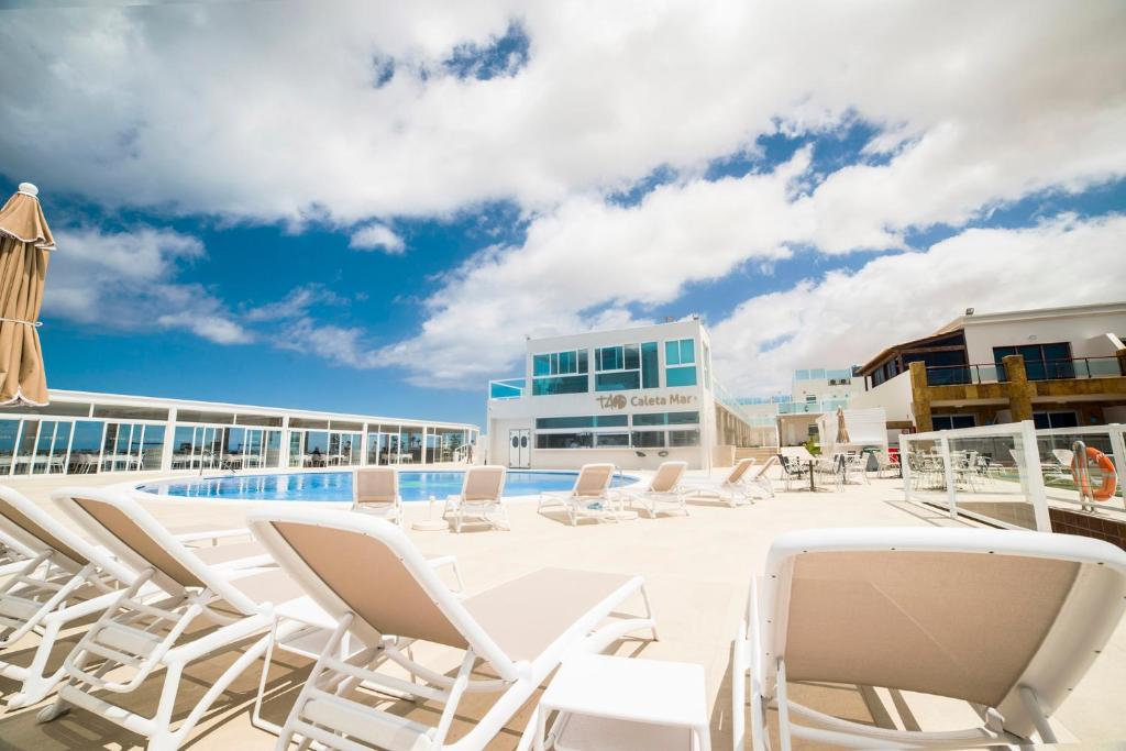 Hotel Boutique TAO Caleta Mar — Swimming pool in Corralejo, Canary Islands