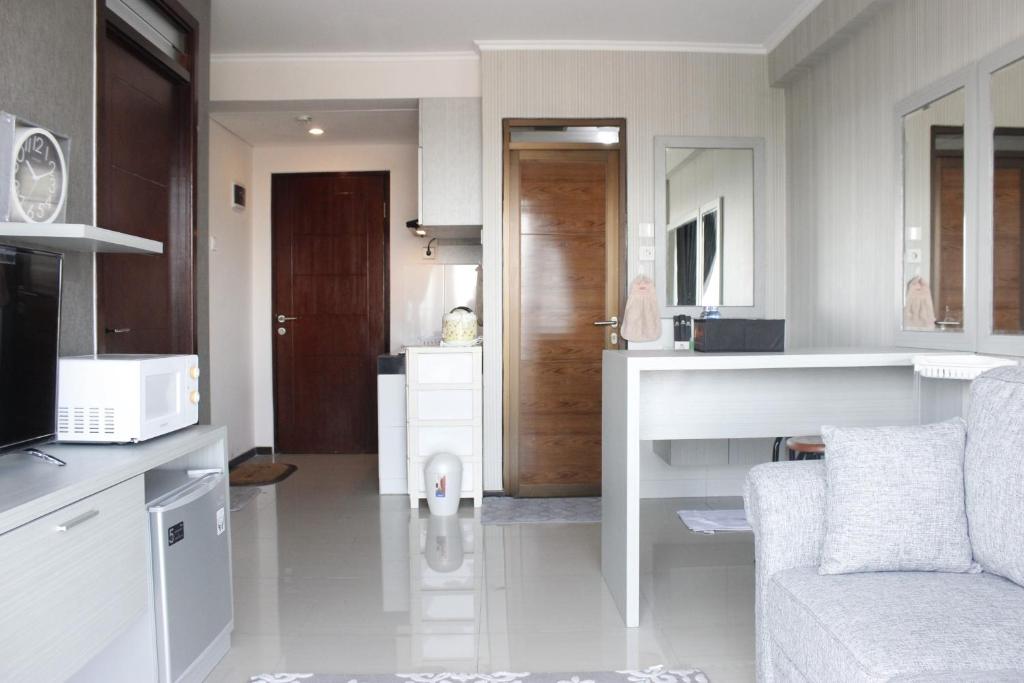 Stylish 2BR Gateway Pasteur Apartment By Travelio