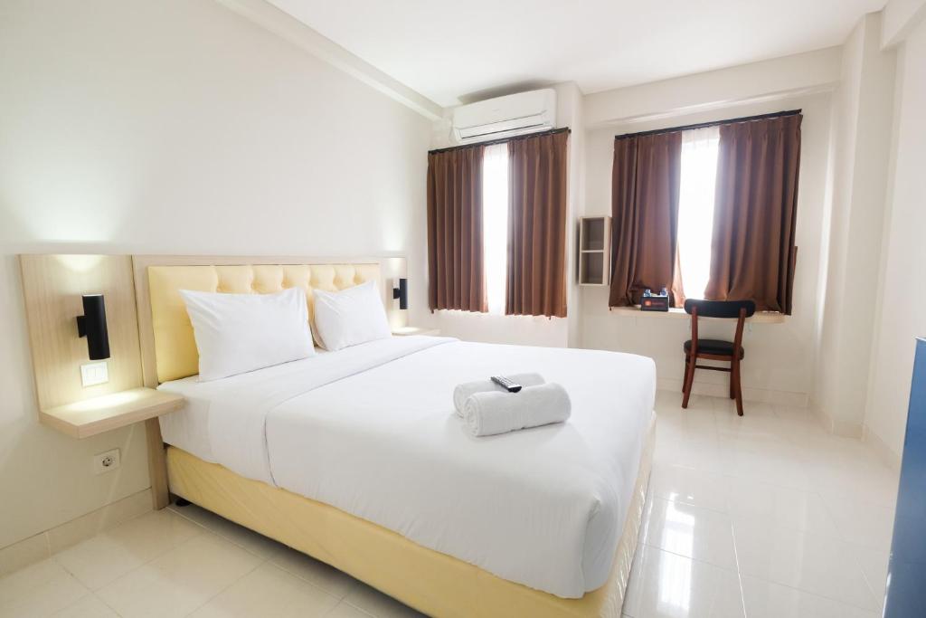 Cozy Studio with City View at Elvis Tower Apartment By Travelio, Cikarang