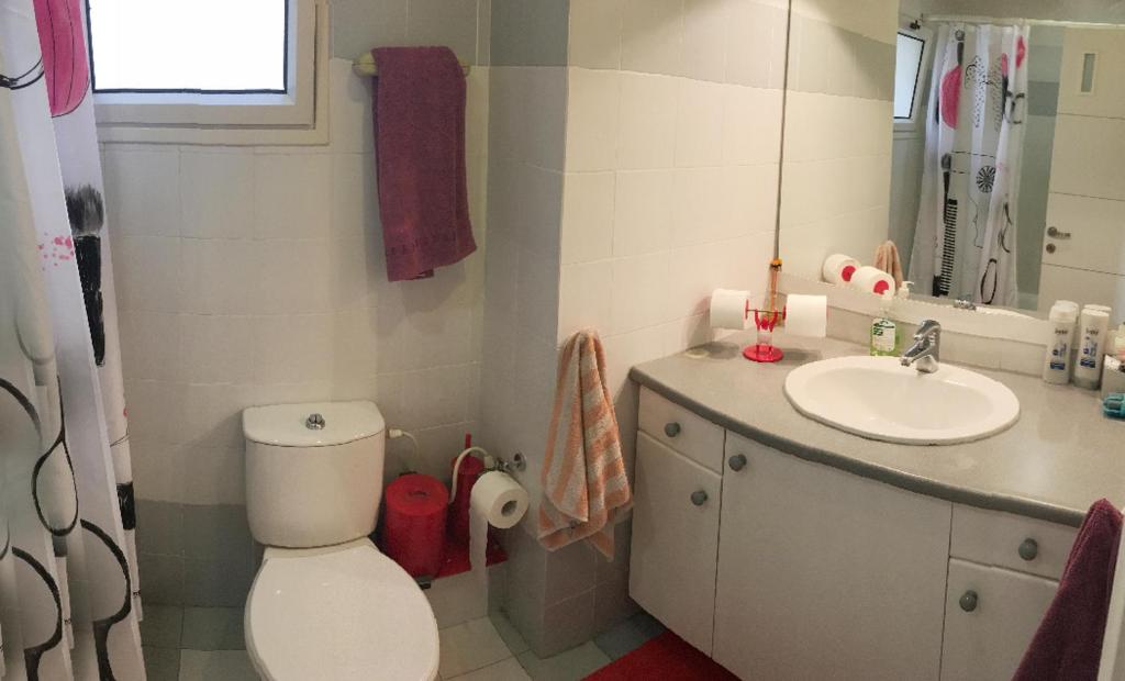 Comfortable quiet room with a private bathroom in shared apartment photo