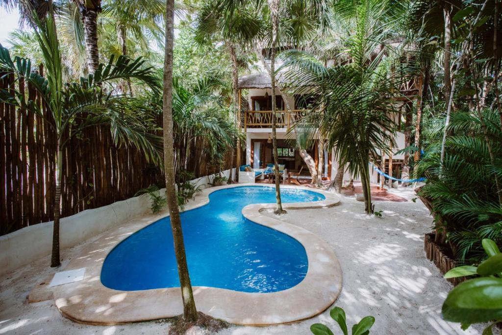 Beachfront villa on Tulum beach hotel zone photo