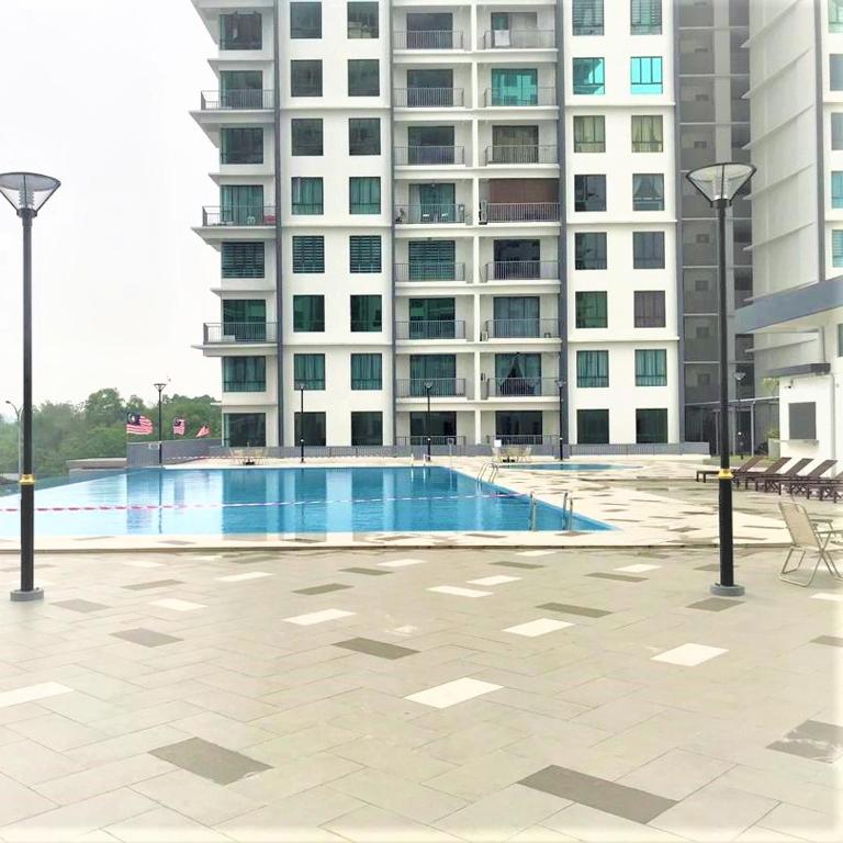 Lvl 22 City Park View 3BR Full Aircond with Pool at Casa Kayangan Meru photo
