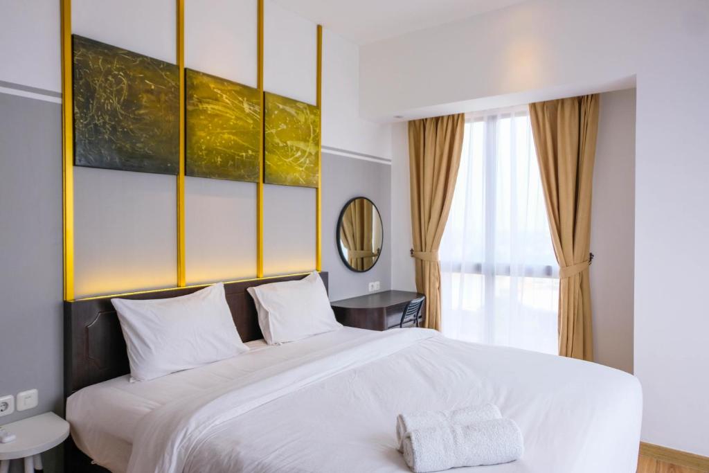 Elegant 2BR Apartment at M-Town Signature near Shopping Mall By Travelio, Tangerang