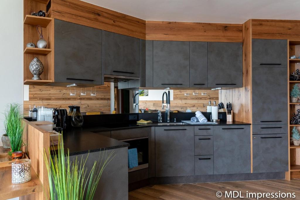 Apartments Adlerhorst Top 1 Zell am See with private sauna and Zell am See Kaprun summercard in summer - 4