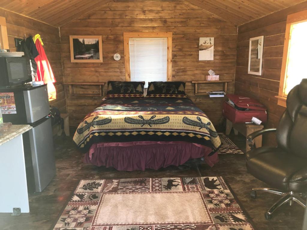 Alaska Log Cabins on the Pond photo