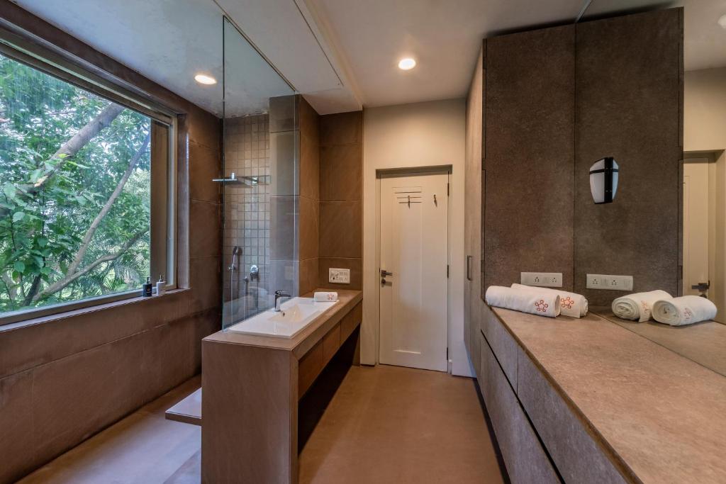 SaffronStays Odeon - art-deco heritage home with heated pool, private forest lawn and terrace photo