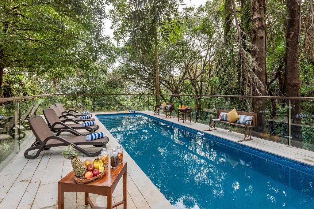 SaffronStays Odeon - art-deco heritage home with heated pool, private forest lawn and terrace photo