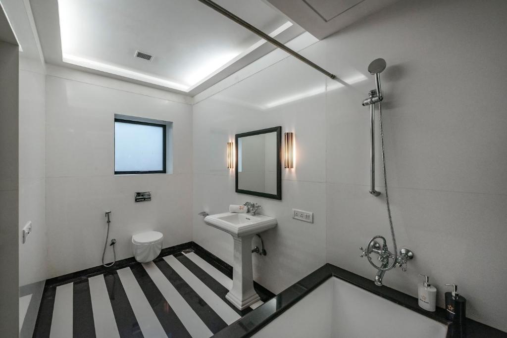 SaffronStays Odeon - art-deco heritage home with heated pool, private forest lawn and terrace photo