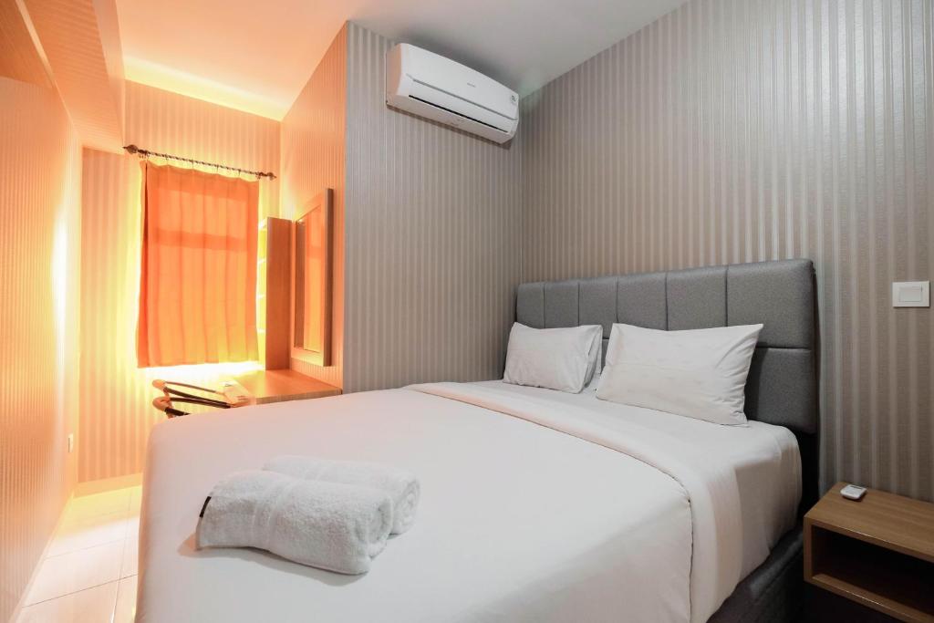 Relaxing 2BR Apartment at The Springlake Summarecon By Travelio, Bekasi