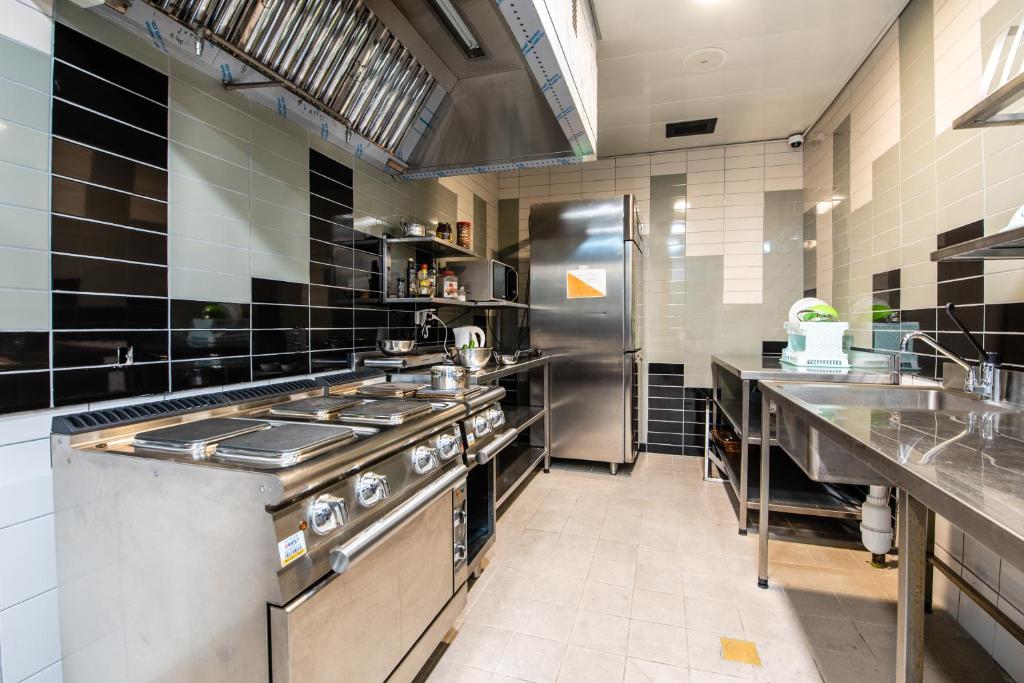 Kitchen, The Spot Hostel in Tel Aviv