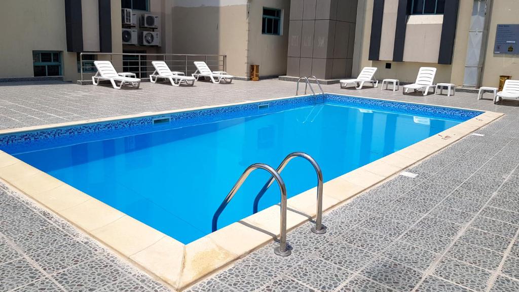 Swimming pool, Al Muntazah Plaza Hotel in Doha