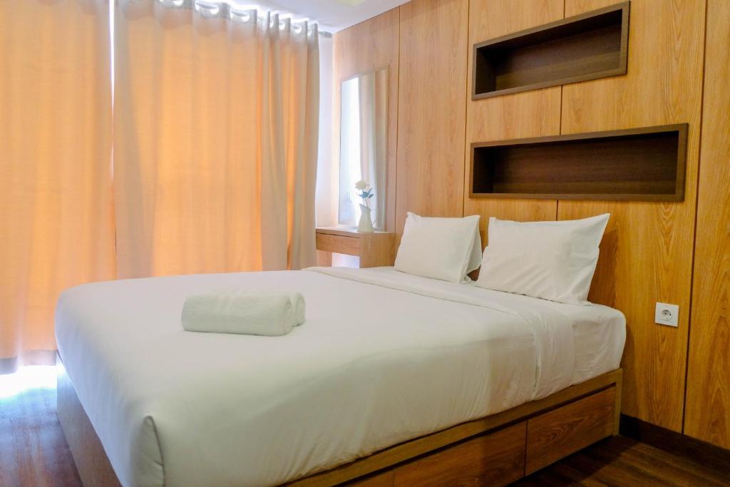 Warm Design Studio Apartment at Casa De Parco By Travelio, Tangerang