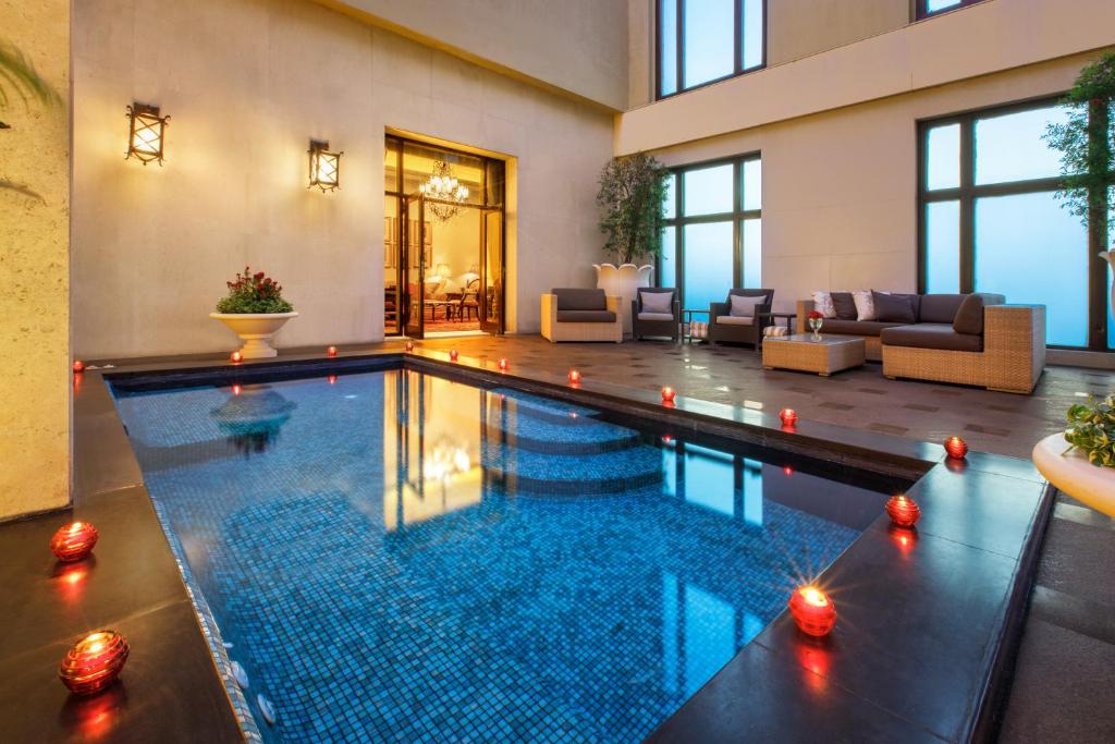 Swimming pool, The Leela Palace New Delhi in New Delhi