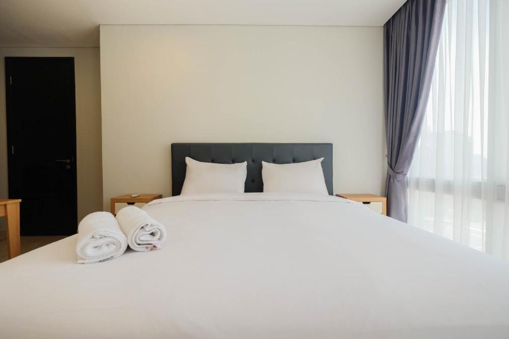 Spacious 2BR at Empyreal The Epicentrum Kuningan Apartment By Travelio, Jakarta