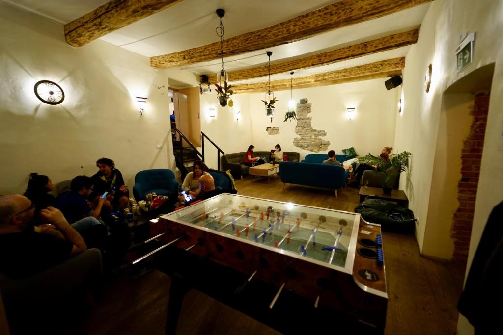 Shared lounge/TV area, The Monks Bunk Hostel & Bar in Tallinn