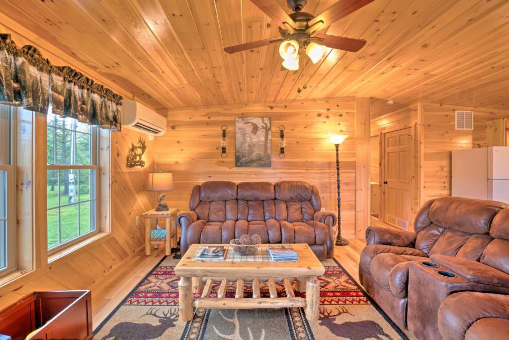 Rustic Benezette Cabin with Porch, Hot Tub and Fire Pit photo