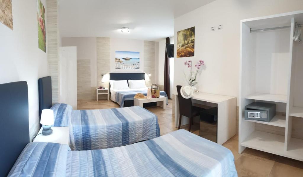 Torre Guaceto Greenblu Resort — Pokoje in Carovigno, Apulia